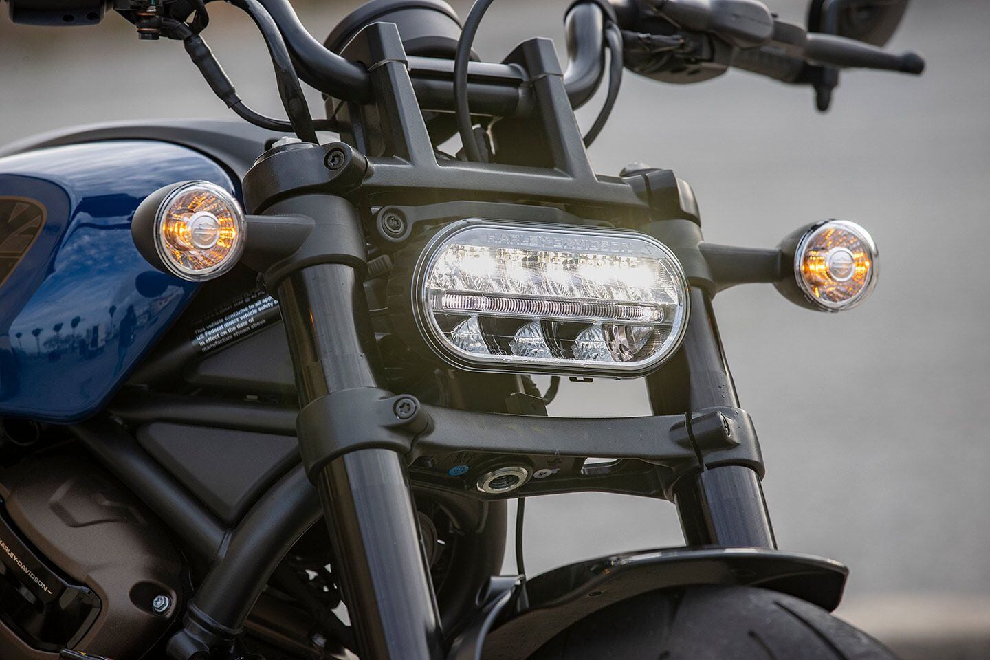 The Sportster’s engine is used as a stressed member of the chassis, meaning there’s no traditional frame. A trellis front frame bolts directly to the engine. Fork legs are spread wide to accommodate the chunky 160/70-17 front tire.