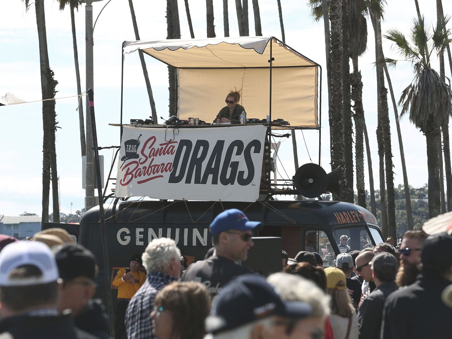 The DJ and announcers' booth sat on an old custom van near the starting line.