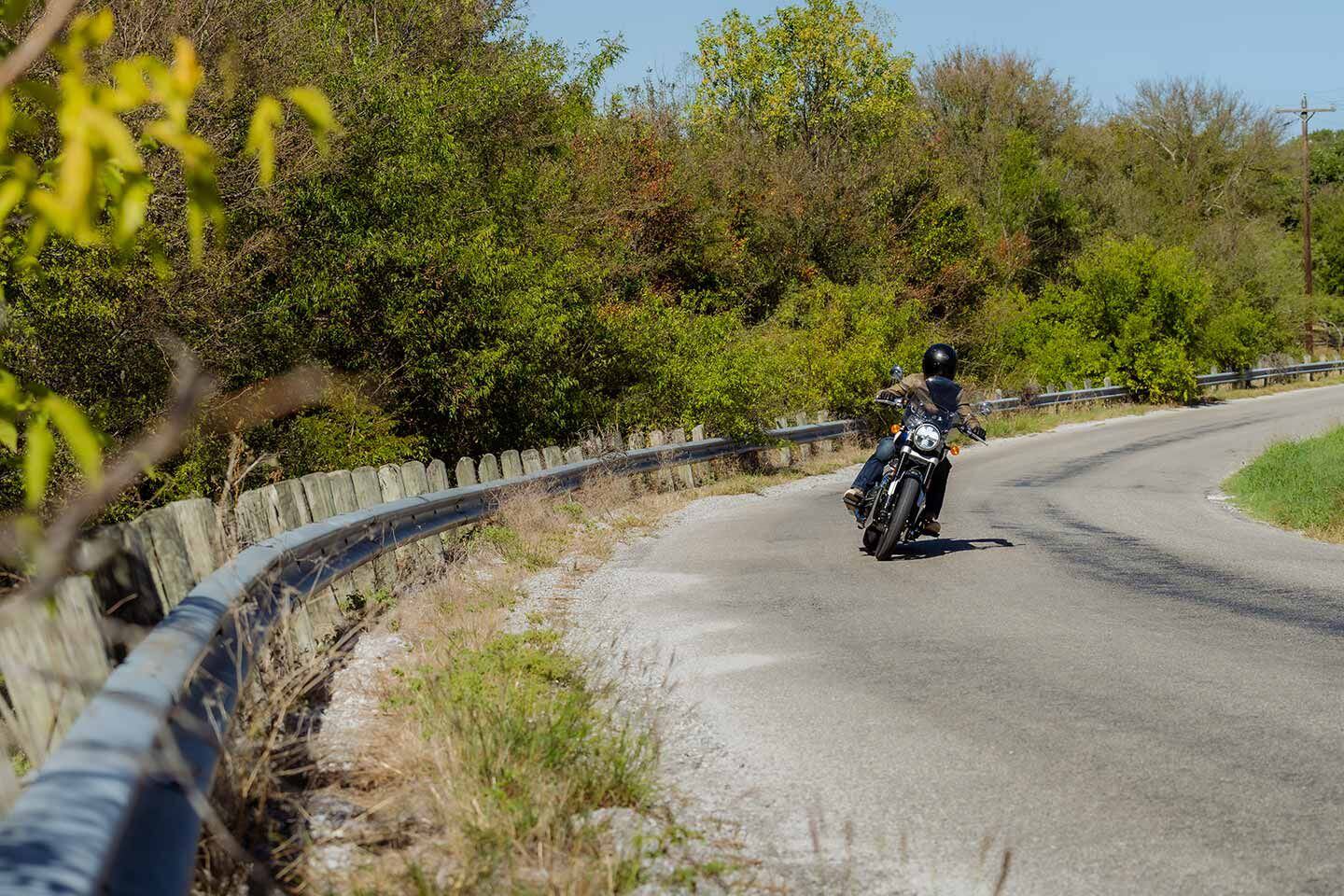 Leaning through one of the few curves available on a backroad near Dallas.