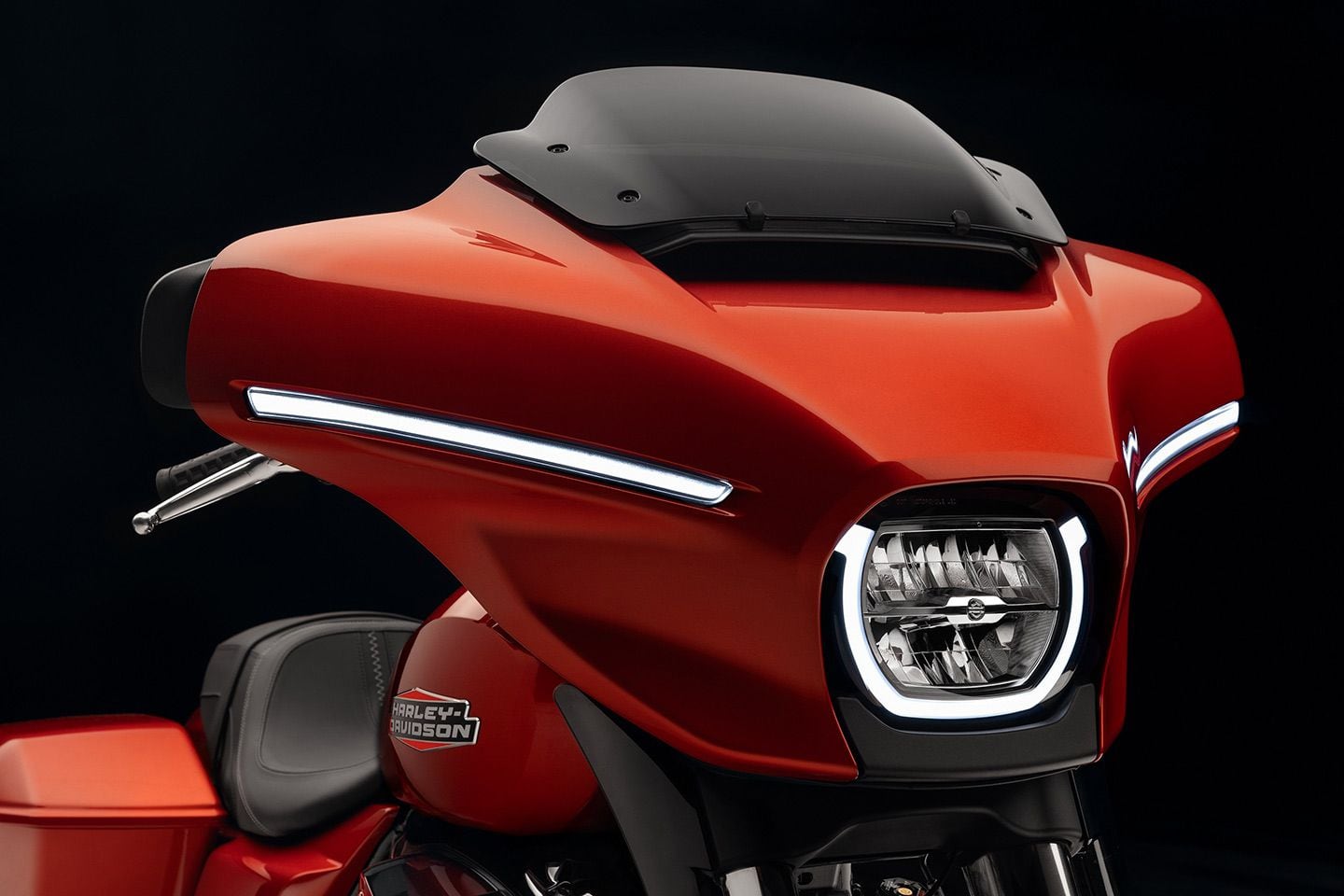 The redesigned fork-mounted fairing on the 2024 Street Glide gets fully integrated LED lighting, and a split-stream vent opening along with improved aerodynamics and a new silhouette.