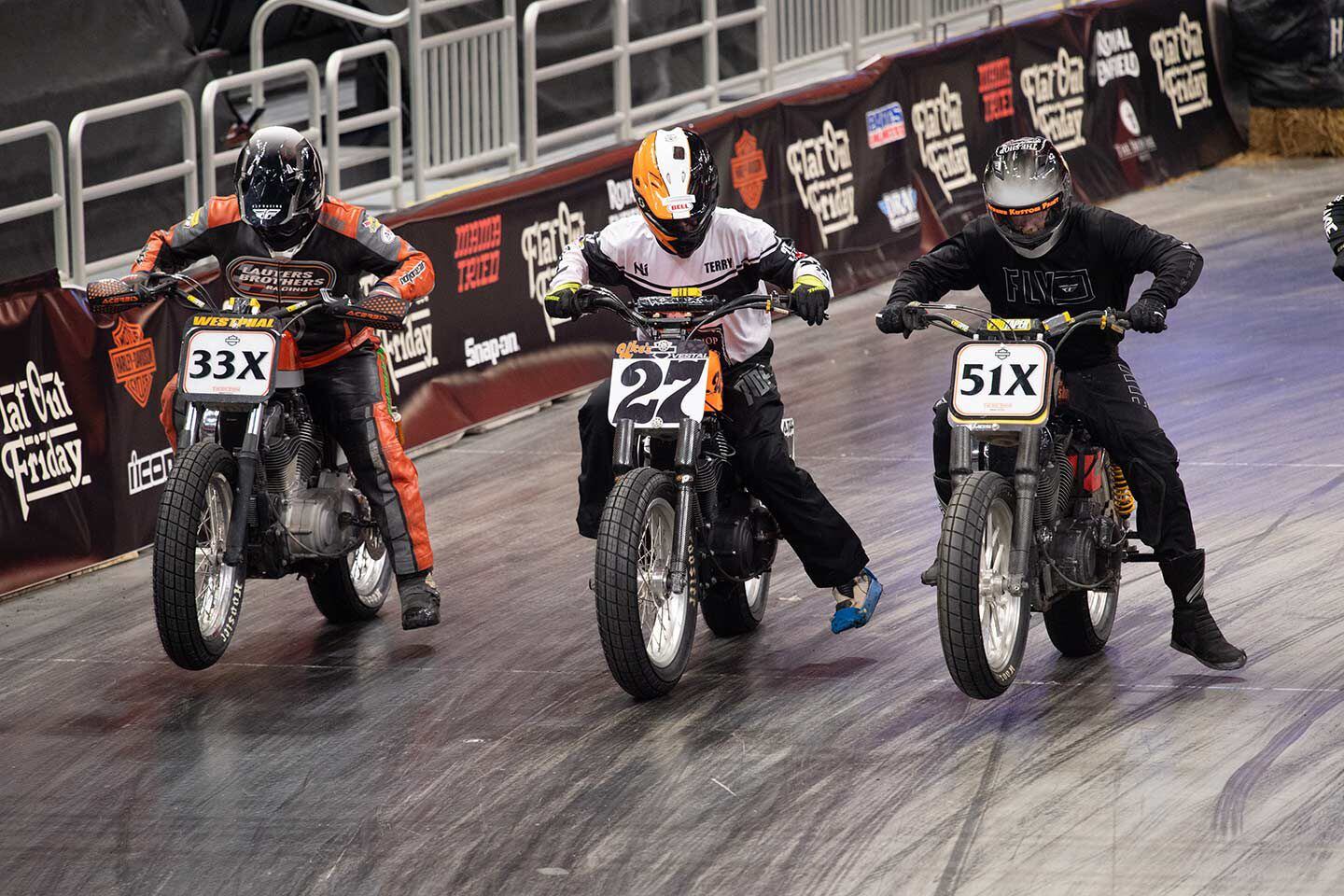 Shane Westphal, Terry Vestal, and Adam Holmes light up the start of their Hooligans class race.