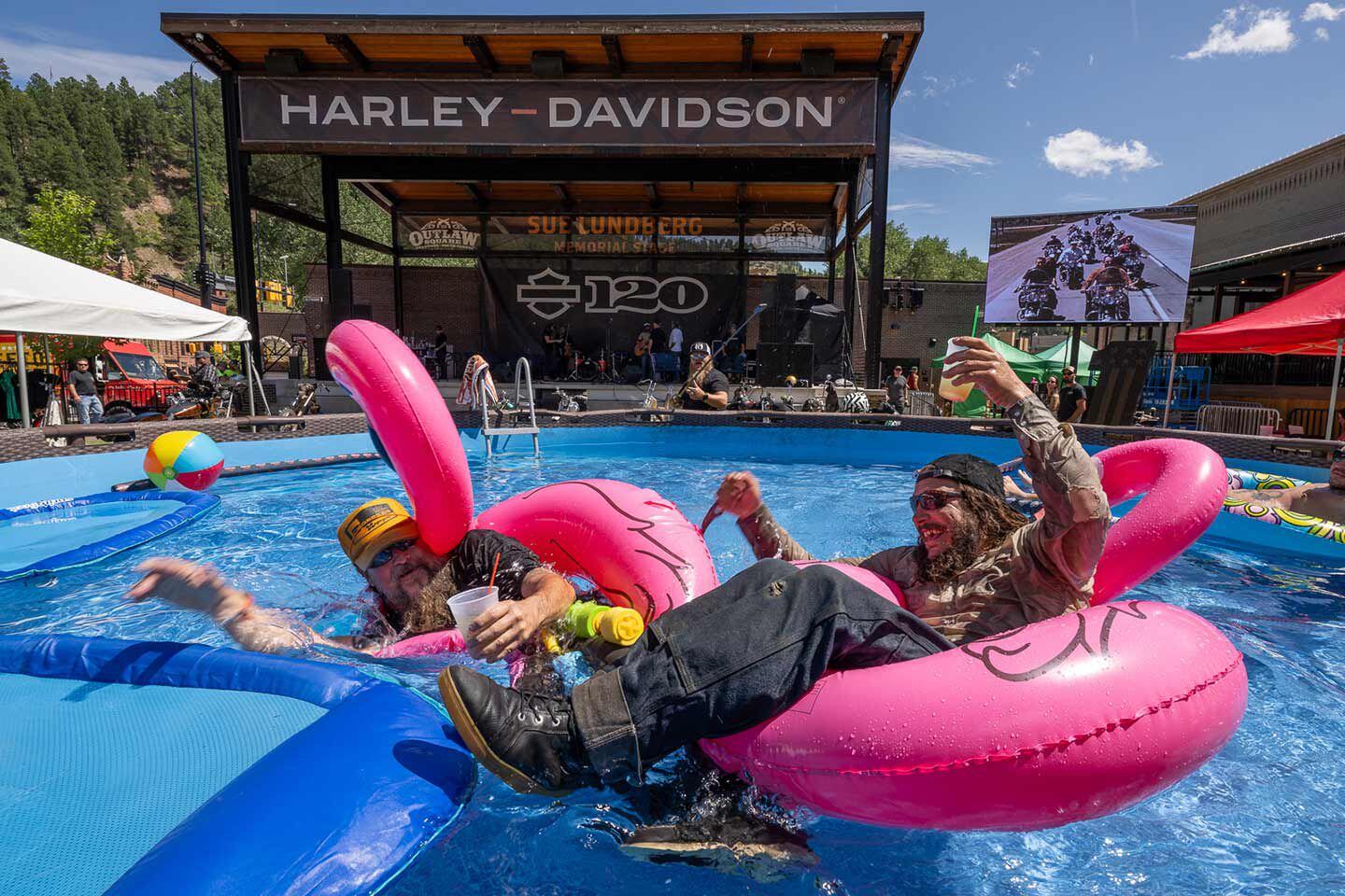 You’re sinking my battleship, man! Danger Dan Hardick (@DangerDanimal) attacks Pat Patterson’s (@LedSledCustoms) dinghy at Pat’s Sportster Showdown in Deadwood, South Dakota.