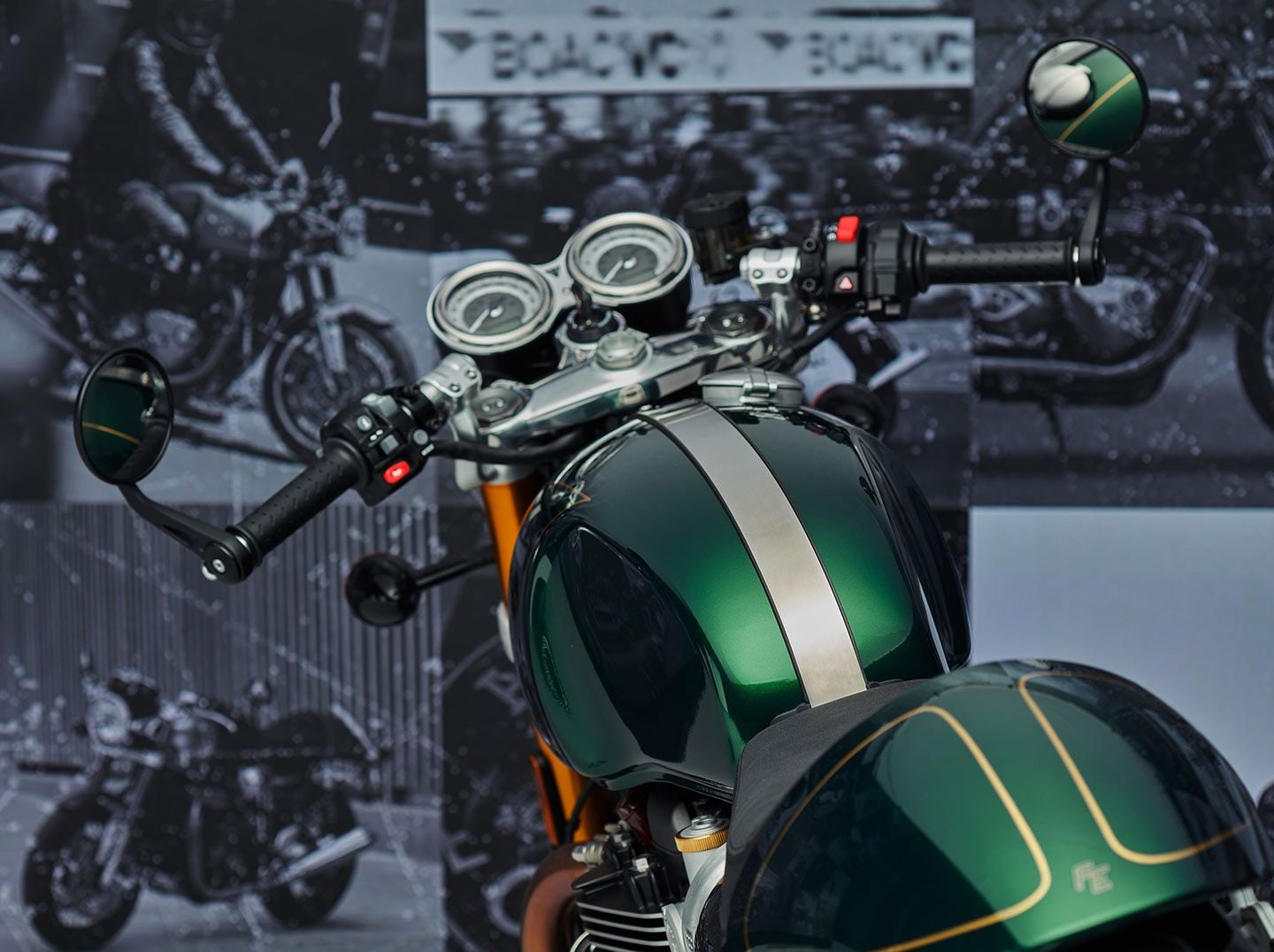 Rear view of the 2025 Thruxton FE shows details like the stainless tank strap, dual gauges, and rear cowling.