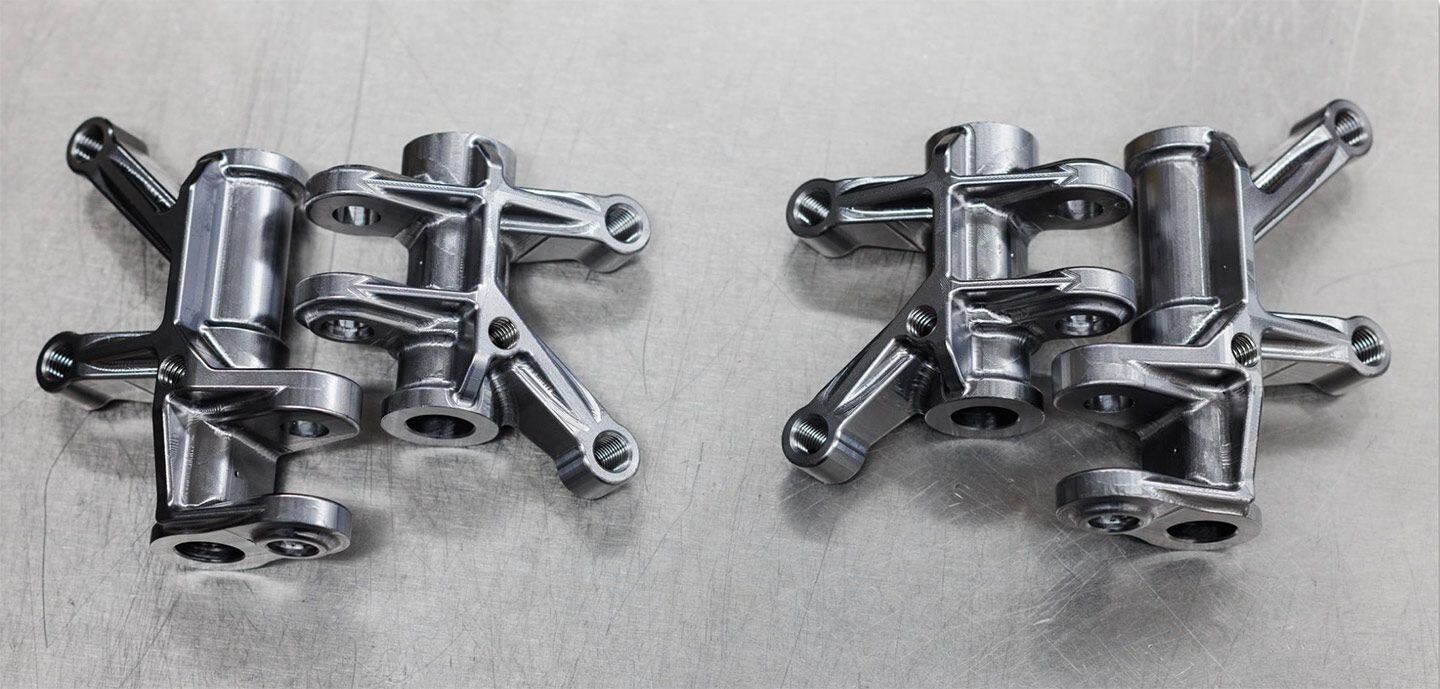These manual lash adjustable rocker arms are machined from a solid chunk of steel.