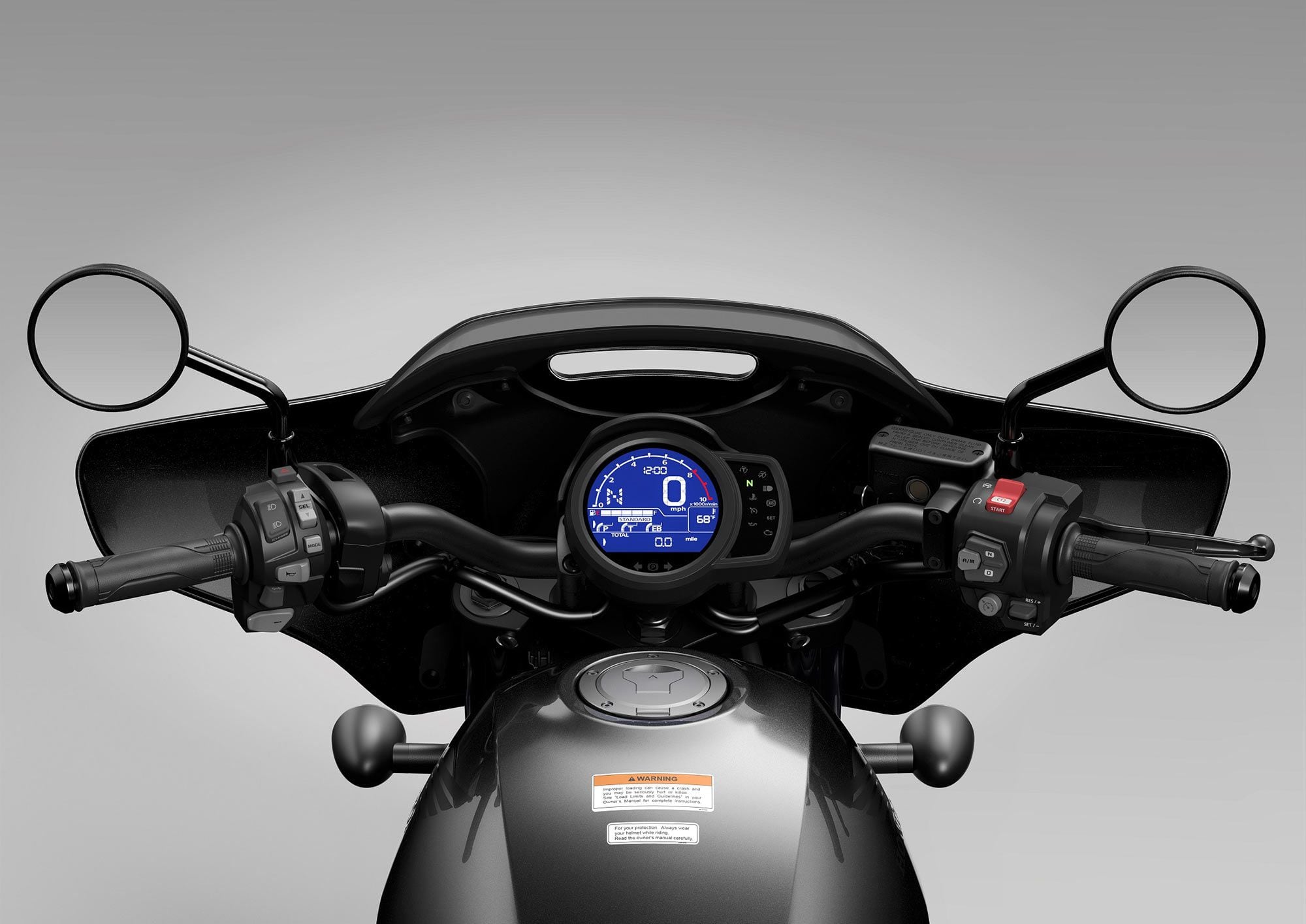 The fairing is a handlebar-mounted unit with a brief “shield” at the top. Instrumentation, electronics, switch gear, and fuel tank are unchanged from the standard 1100.