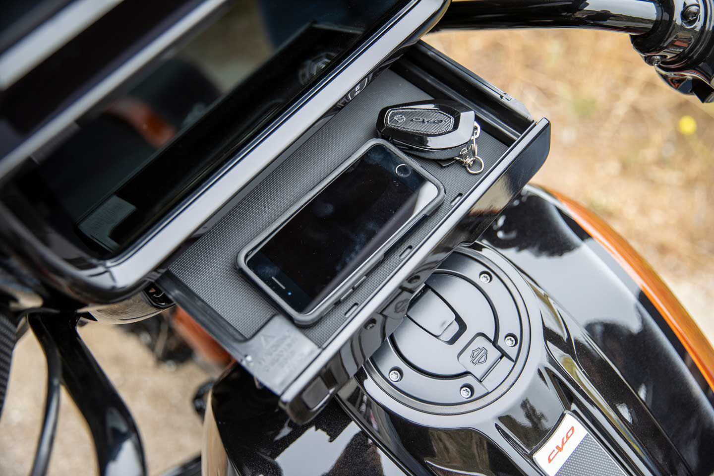 A massive slide-out drawer in the CVO Street Glide’s fairing has room for all the phones.