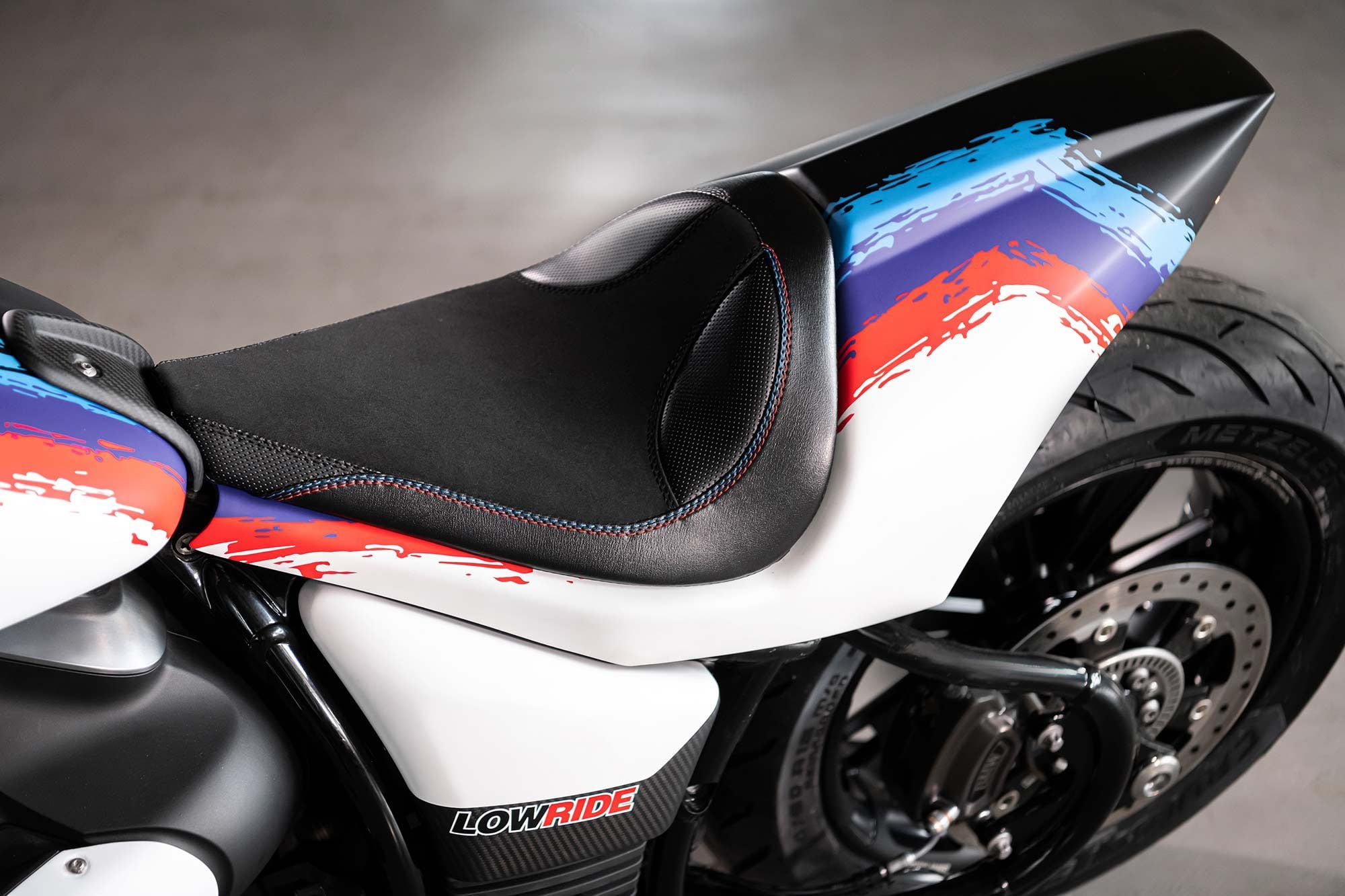 Saddle is courtesy of L.R. Leather; M-inspired paintwork is by Dox Art Factory.