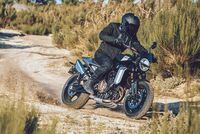 2024 Husqvarna Svartpilen 801 riding on sandy dirt road