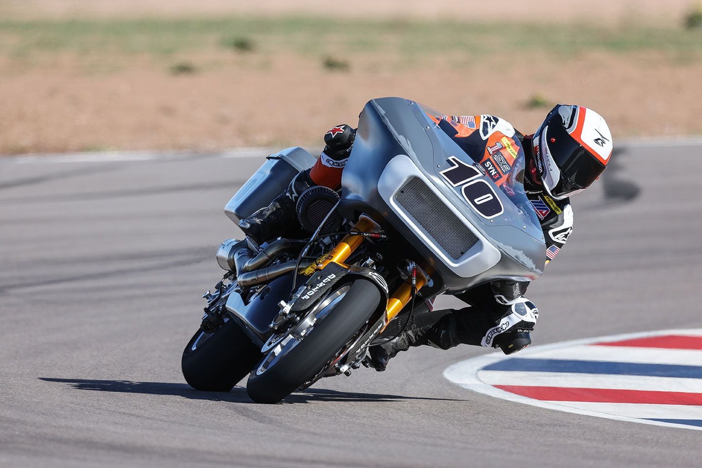 An oil cooler sits where the headlights would normally be found inside the Road Glide fairing.