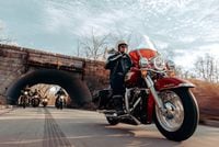 2024 Harley Davidson Hydra Glide Revival riding on country road