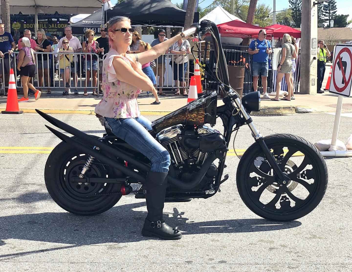 Women represented at Bike Week on all types of machines.