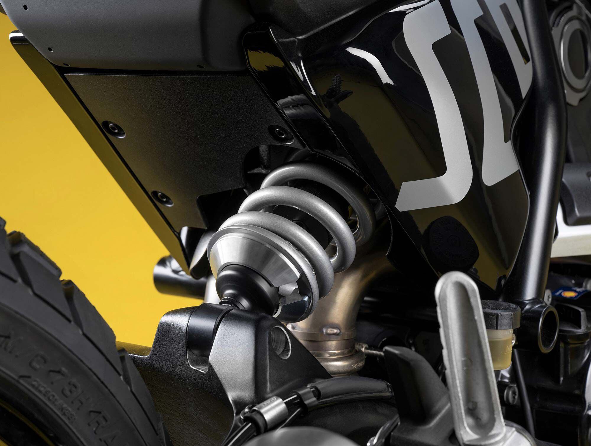 The swingarm is redesigned with the rear shock moving closer to the bike center; the rear subframe is now removable.