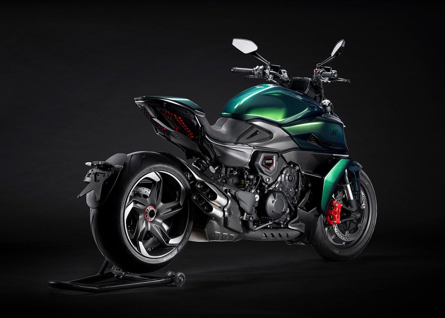 Like the car, the bike rocks a rich green color, but uses the same mechanical elements of the base Diavel V4.