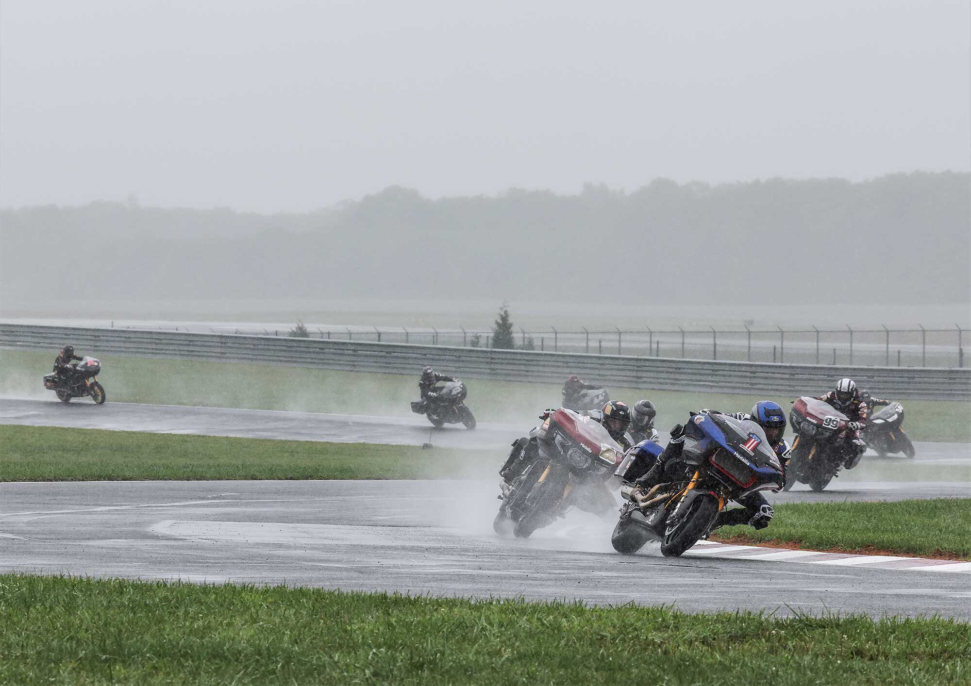 Negotiating 150 hp, 650-pound bikes in these conditions? Whew. Here, Kyle Wyman surfs his Harley Road Glide Special around New Jersey Motorsports Park just ahead of Tyler O’Hara’s Indian Challenger.
