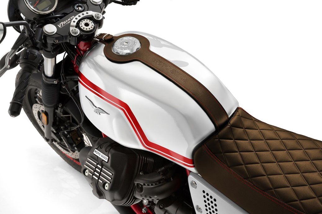 Gloss white paint, an updated quilted saddle, and leather tank trim distinguish this Guzzi from the other V7 III Racer.