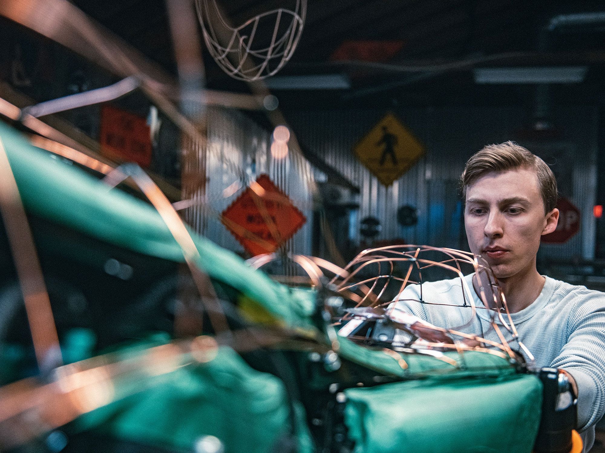 Jay Donovan bending and tacking the wire form on the Sportster.