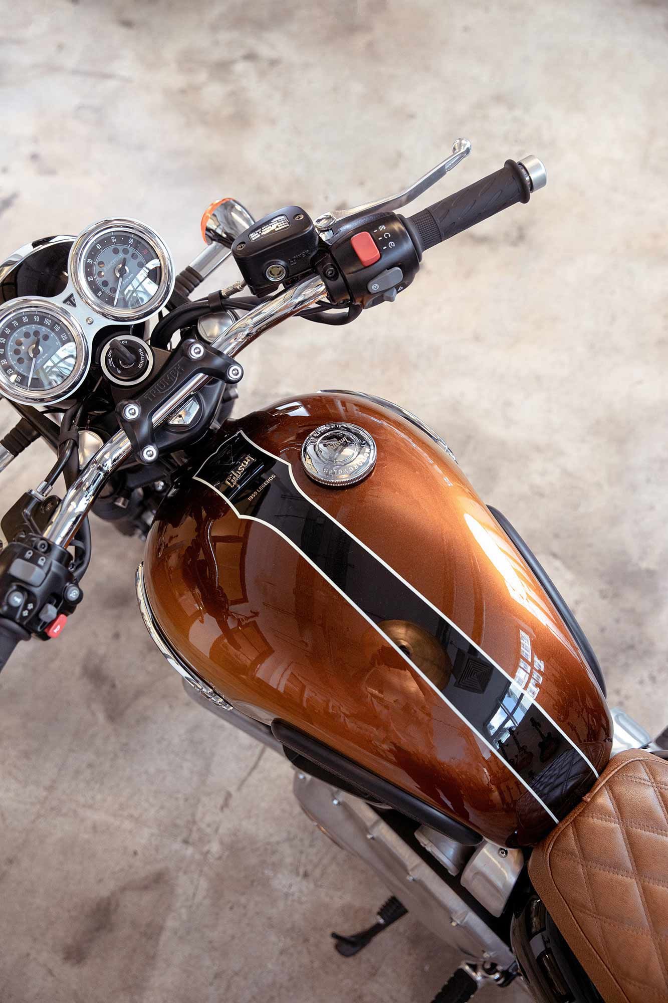 triumph thruxton tank strap