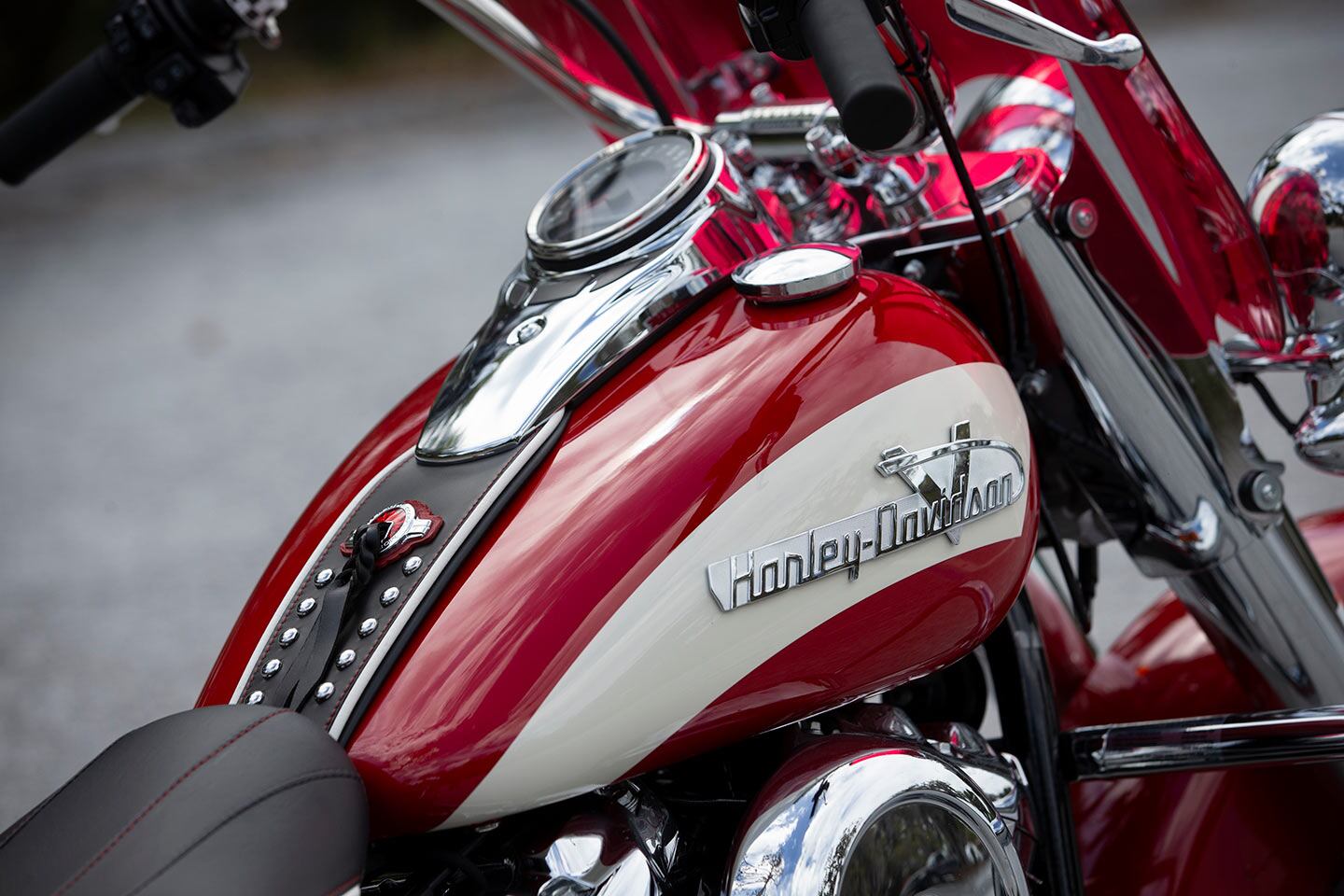 It might help to look twice; 1950s cues include stylized Harley-Davidson font with V flourish. Two-tone 