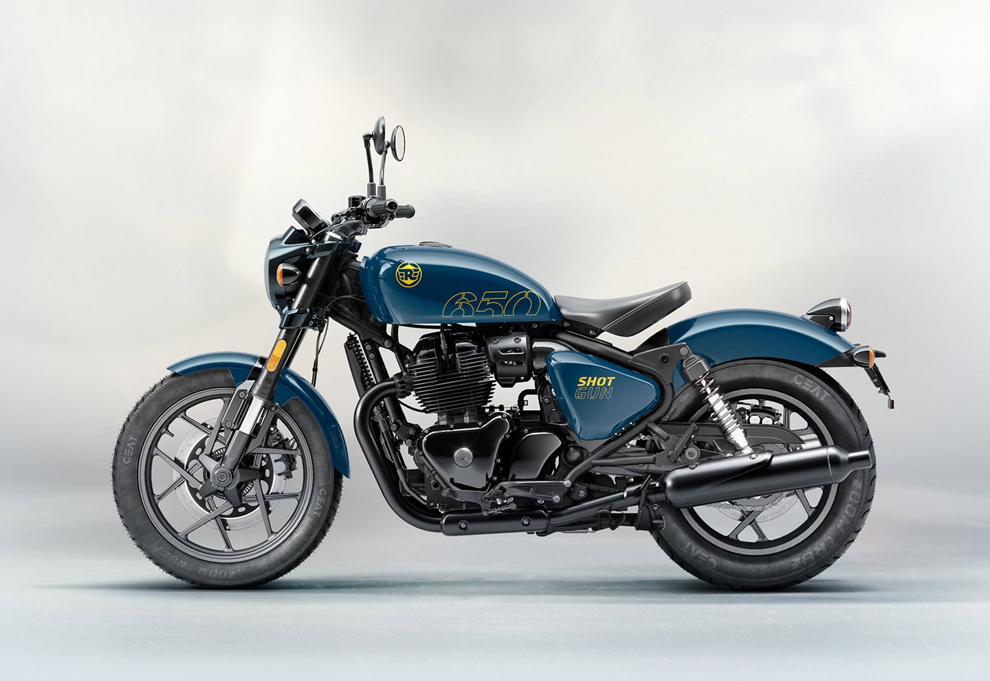 Blacked-out engine components and chopped fenders reflect the Shotgun's custom leanings. This is the Plasma Blue color option.