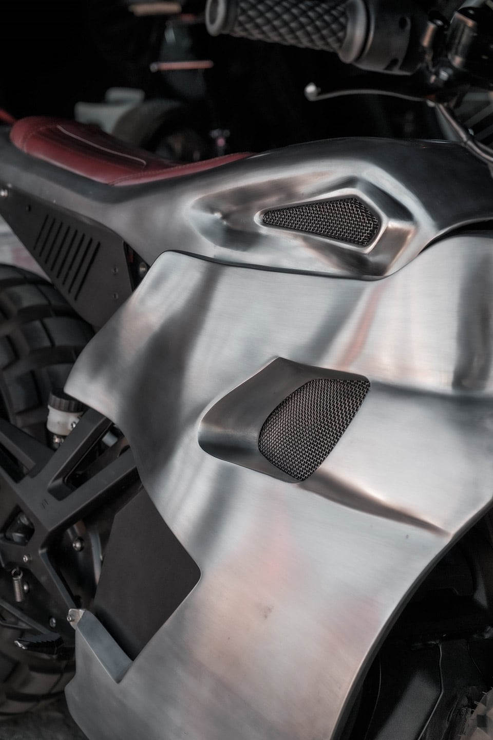 Custom side panels can be taken off to get at the removable battery.