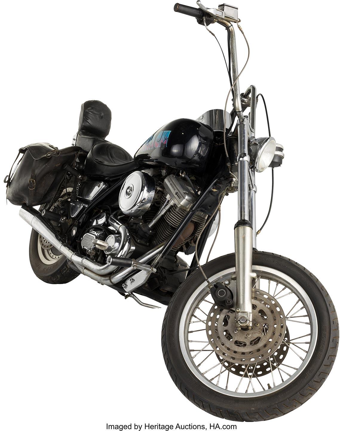 Fork tubes definitely look extended over stock, but by how much is anyone's guess.