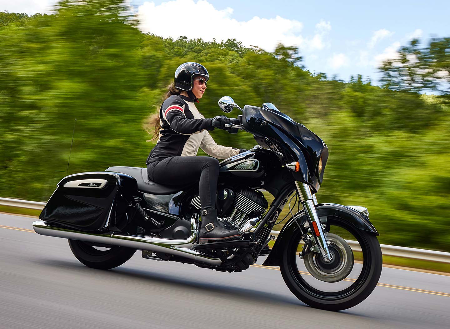 Different styling, a fork-mounted fairing, and the Thunderstroke 111 engine distinguish the Chieftain from the Challenger.