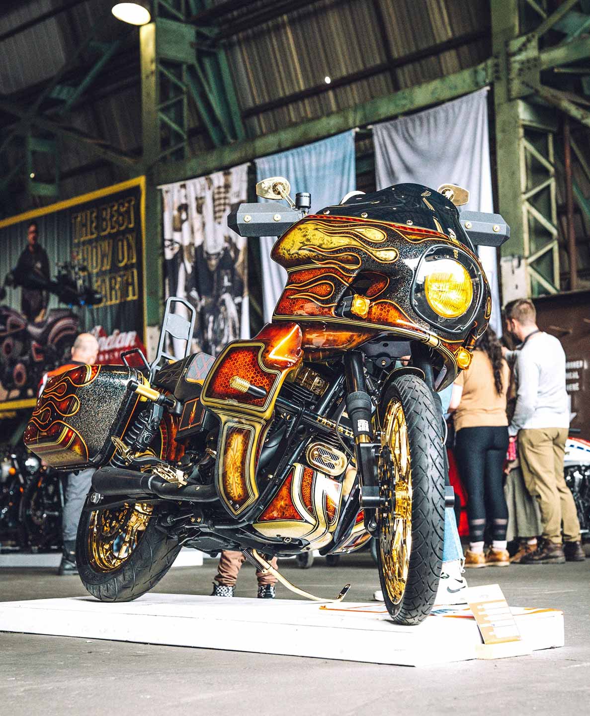 Mike Aldridge of MidCity SmashedBurger fame won the coveted Champ of Champs award—aka Best In Show—at this year's event with his Harley Low Rider–based custom. With a Barnett clutch, Brembo dual discs, Galfer rotors, Brock's swingarm, 24K gold Jade Affiliated wheels, Fox QSR shock and way, way more—the level of detail on this 2001 bike is insane, and the photo does not do it justice.