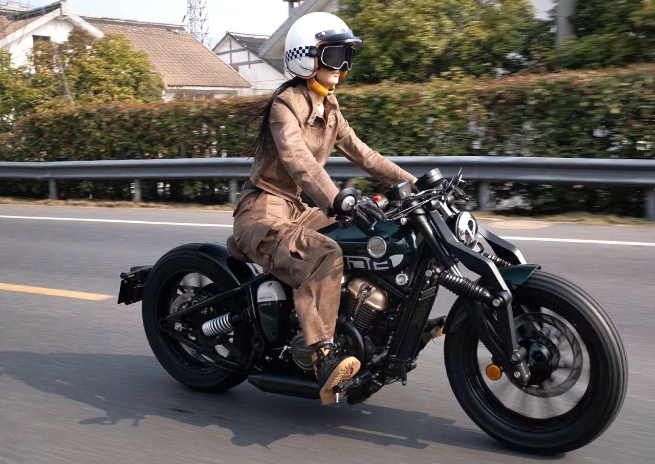 A girder fork and a liquid-cooled DOHC V-twin engine on an entry-level cruiser? Bring it on, we say.