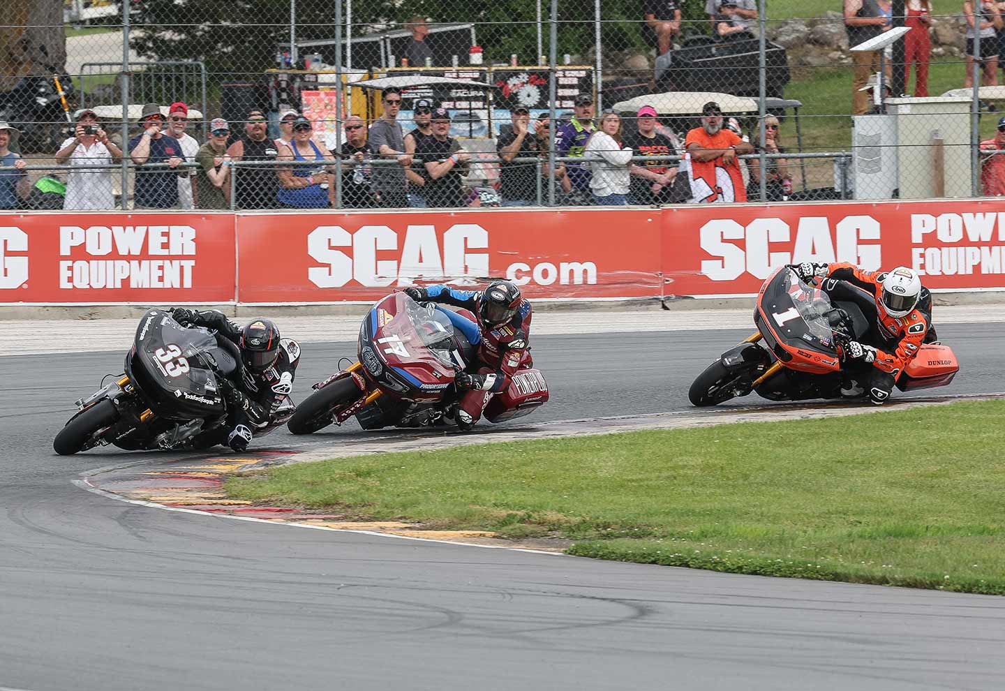 H-D's Kyle Wyman (33) and Indian's Troy Herfoss (17) have been battling for the top slot in the King of the Baggers series standings since the start of the 2024 season. Herfoss currently leads by nine points.
