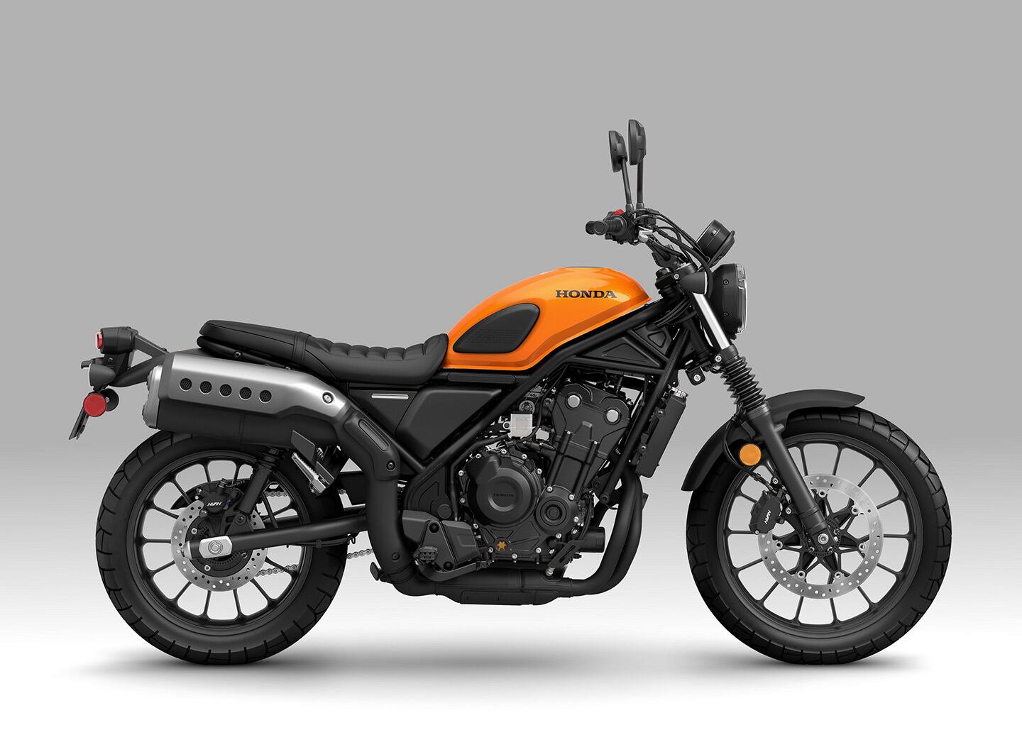 The 2024 Honda SCL500 in Candy Orange.