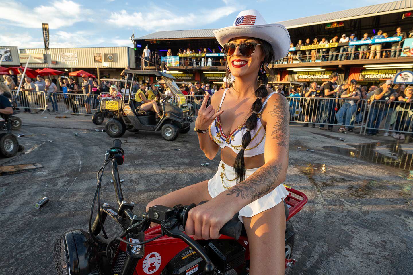 As 2023 Miss Buffalo Chip Poster Model, ambassador and model Em Powered (@__em.powered__) adds to the craziness at the Chip.
