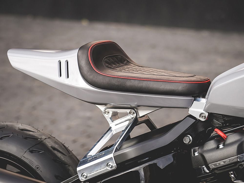 Premium leather covers the solo saddle, which itself sits on a Blacktrack-built tailsection.